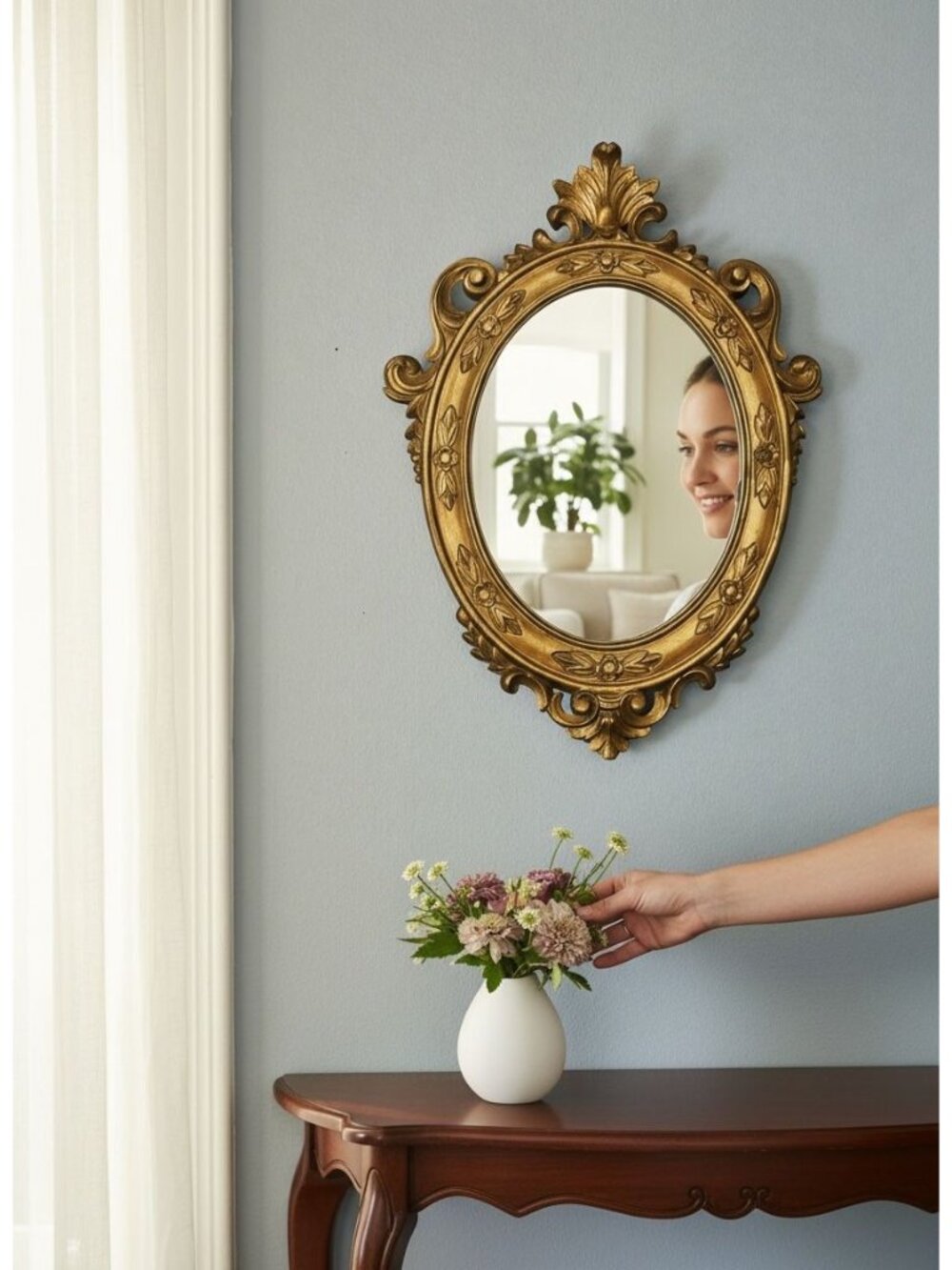 Ornate Gold Oval Mirror With Floral Details & Vintage Frame Design